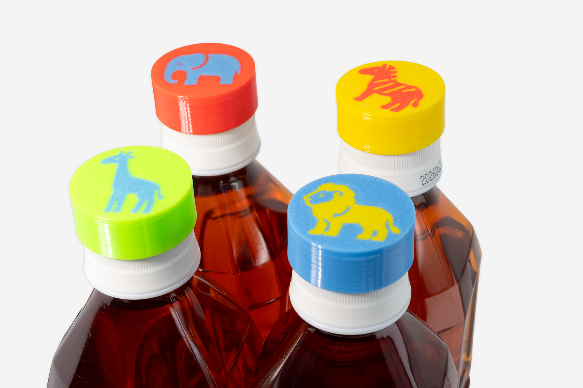 「誰が飲んだかわからない」を解決 ペットボトルにつける目印キャップ ― 家族のお出かけにちょうどいい8個セット ―４色一覧画像